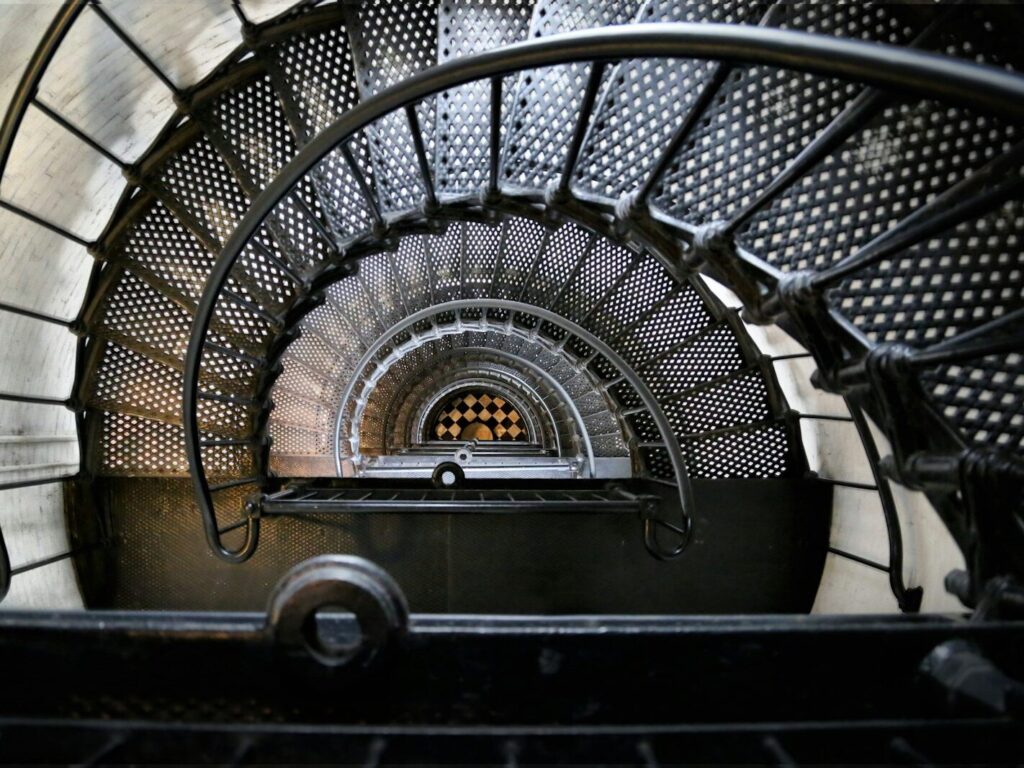 black spiral staircase with black metal railings